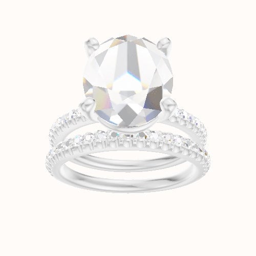 illusion Pave Engagement Ring With High Set Four Prong Head and Matching Band