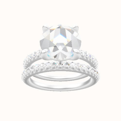 illusion Pave Engagement Ring With Low Set Four Prong Head and Matching Band