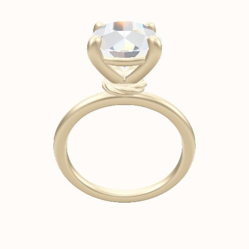 Classic Solitaire Engagement Ring With Low Set Four Prong Head
